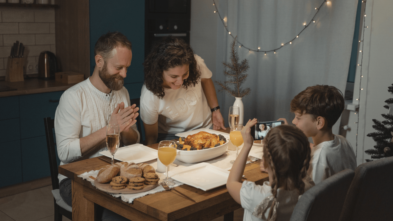 a family sitting at a table