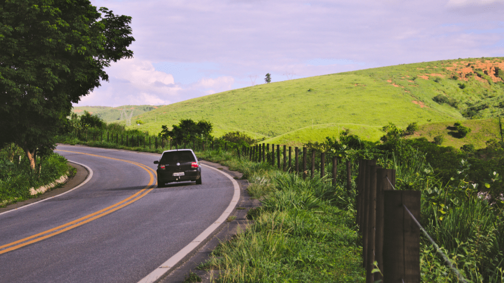 a car driving down a country road