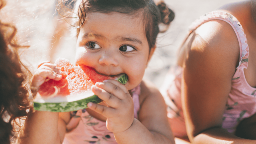 a person eating a watermelon