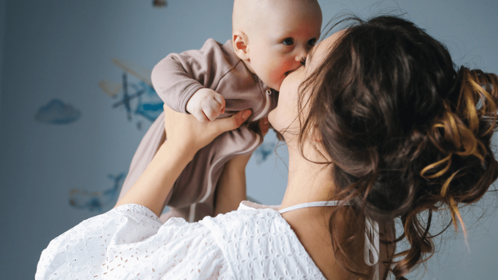 a person holding a baby