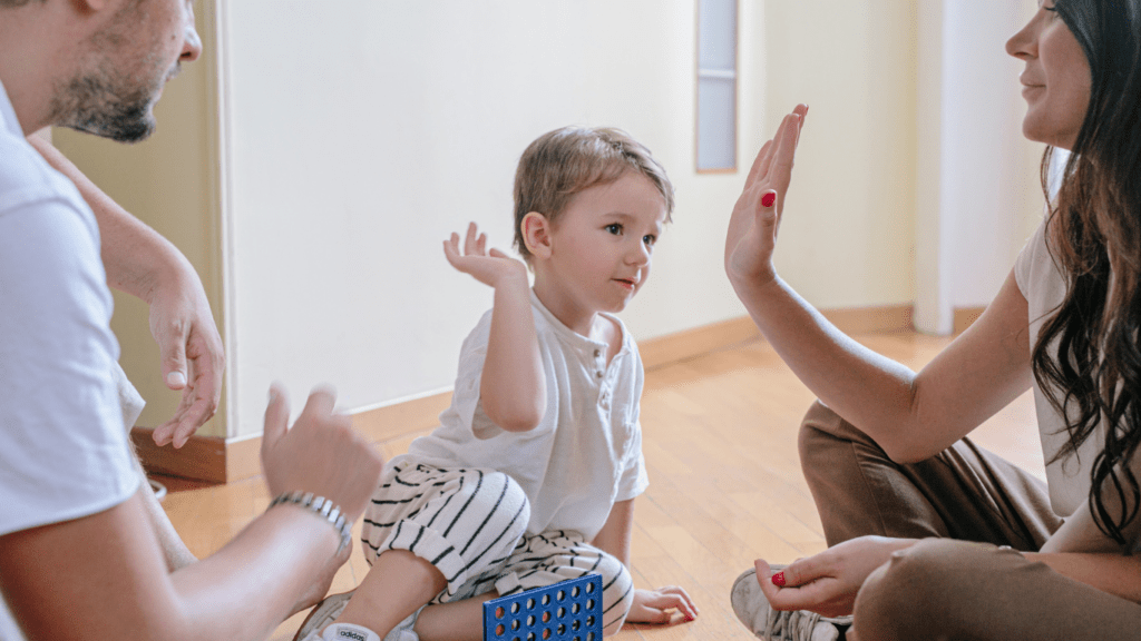 people playing with toys on the floor