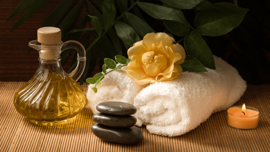 soap and towels on a wooden tray in a bathroom